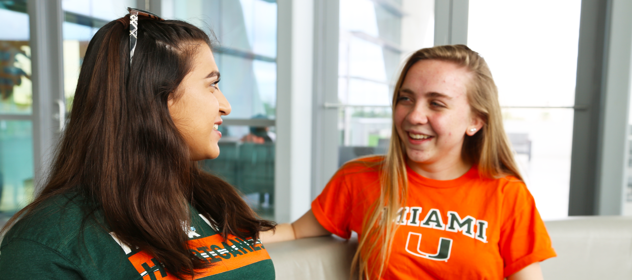 students talking on couch in Shalala Student Center