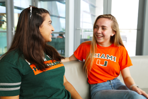 students talking on couch in Shalala Student Center